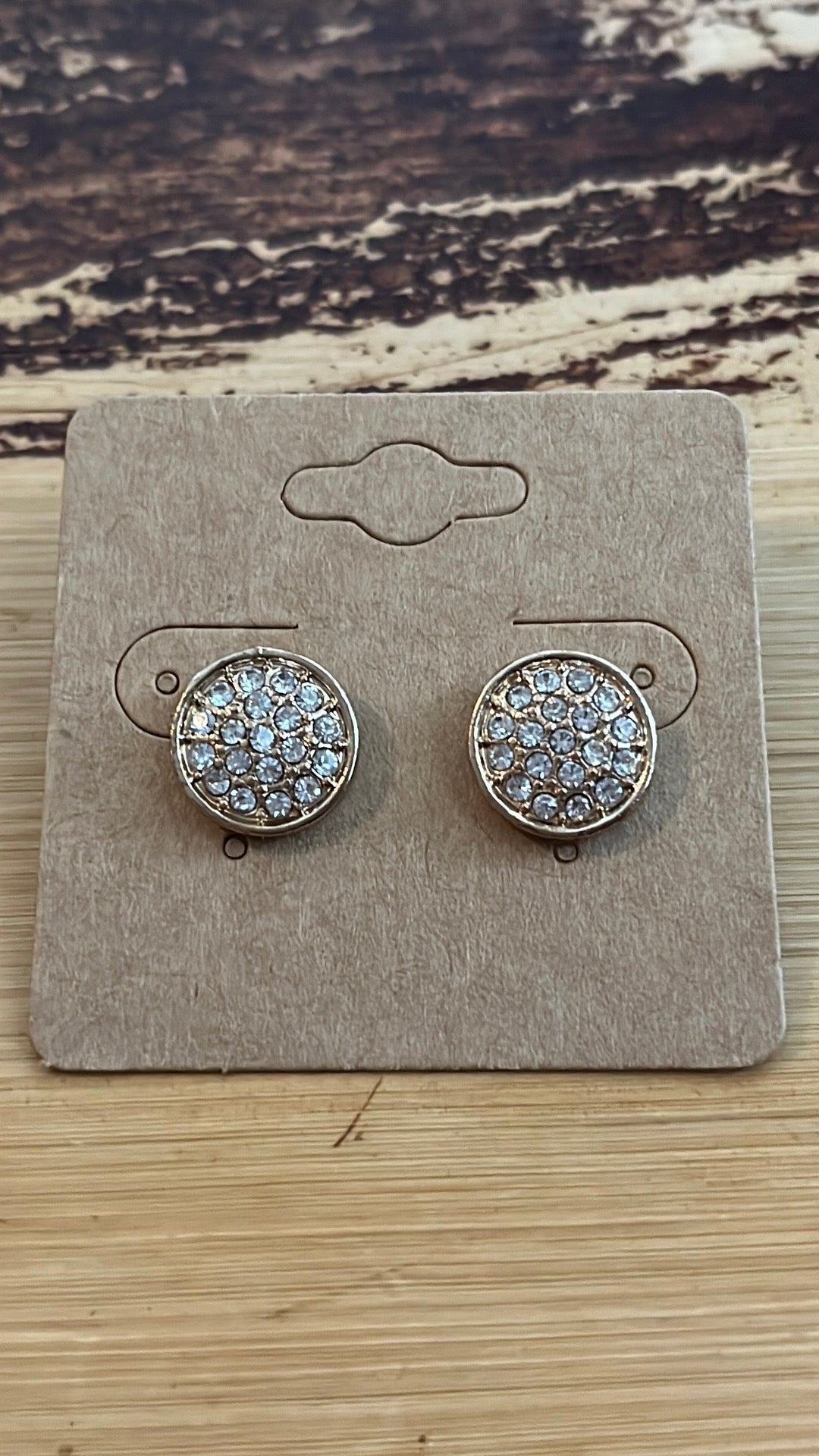 Small gold pierced earrings with CZ