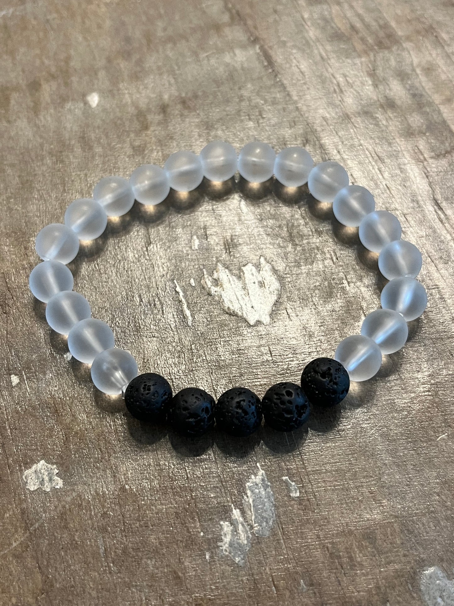 White opaque and black volcanic bead bracelet