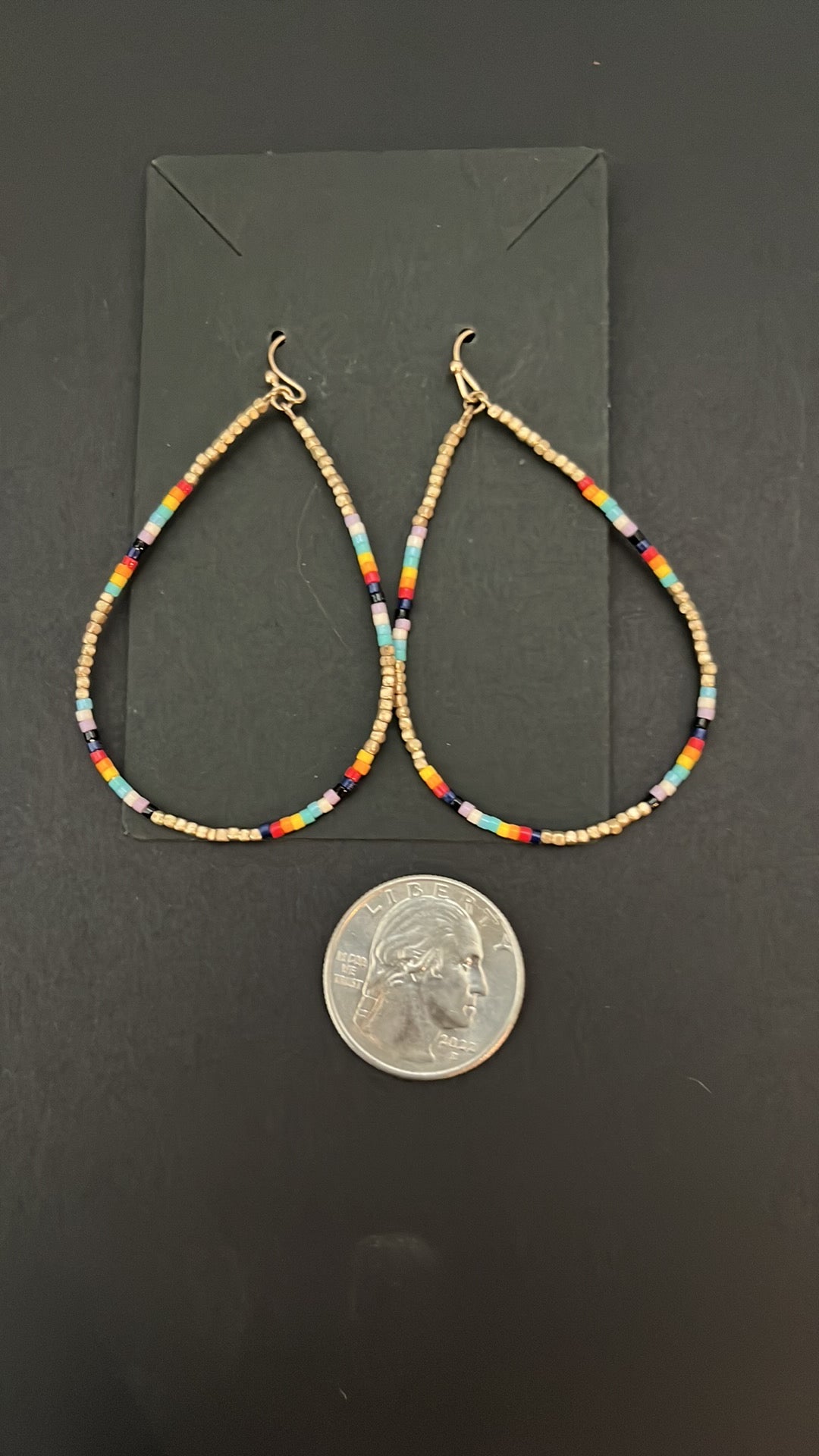 Tear drop earring with multi-colored rice beads