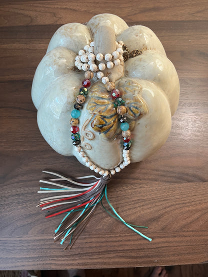 Boho beaded necklace with a tassel pendant