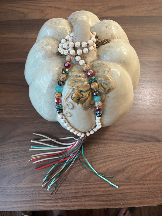 Boho beaded necklace with a tassel pendant