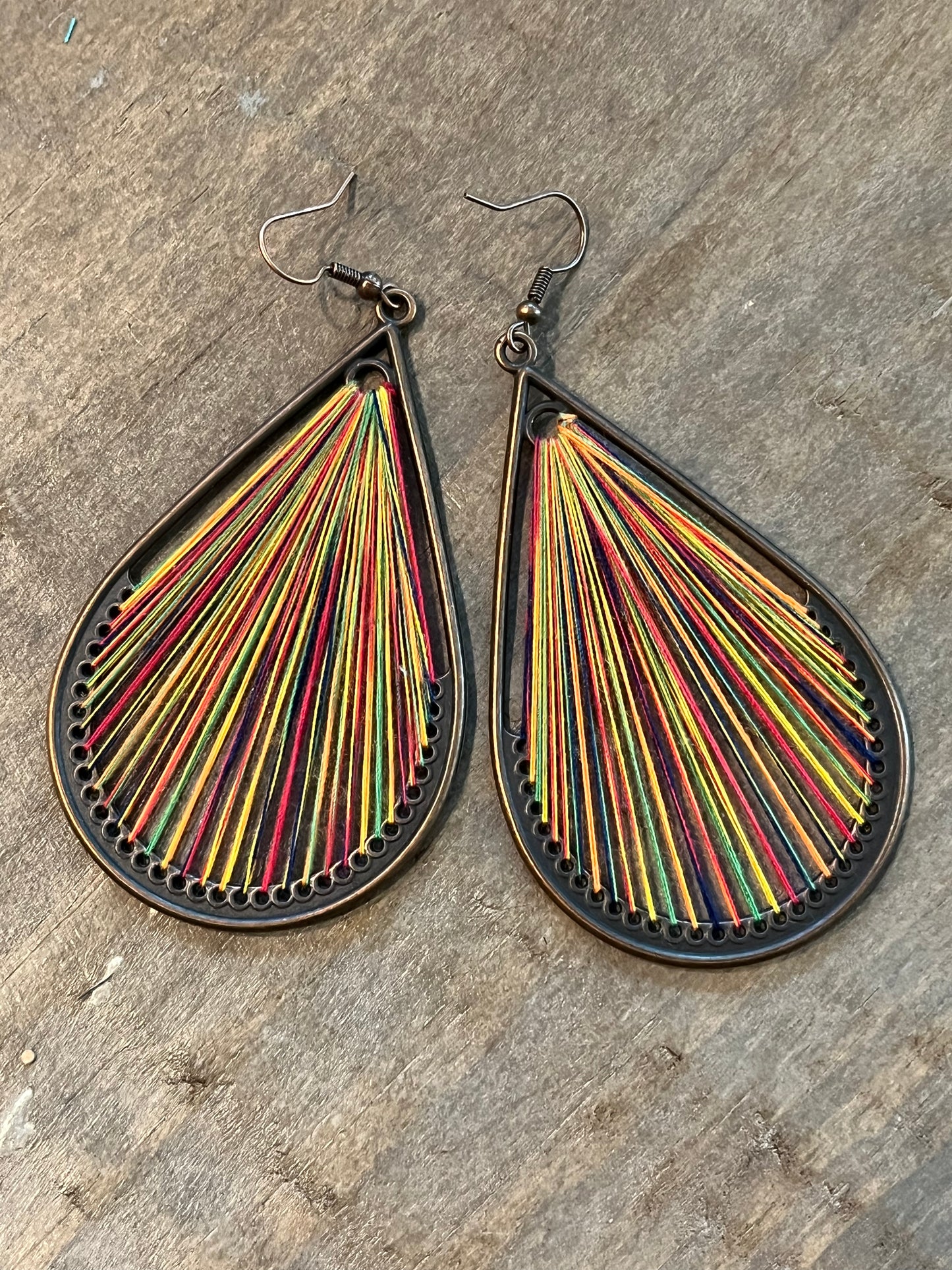 Bronze drop earrings with multicolored threading