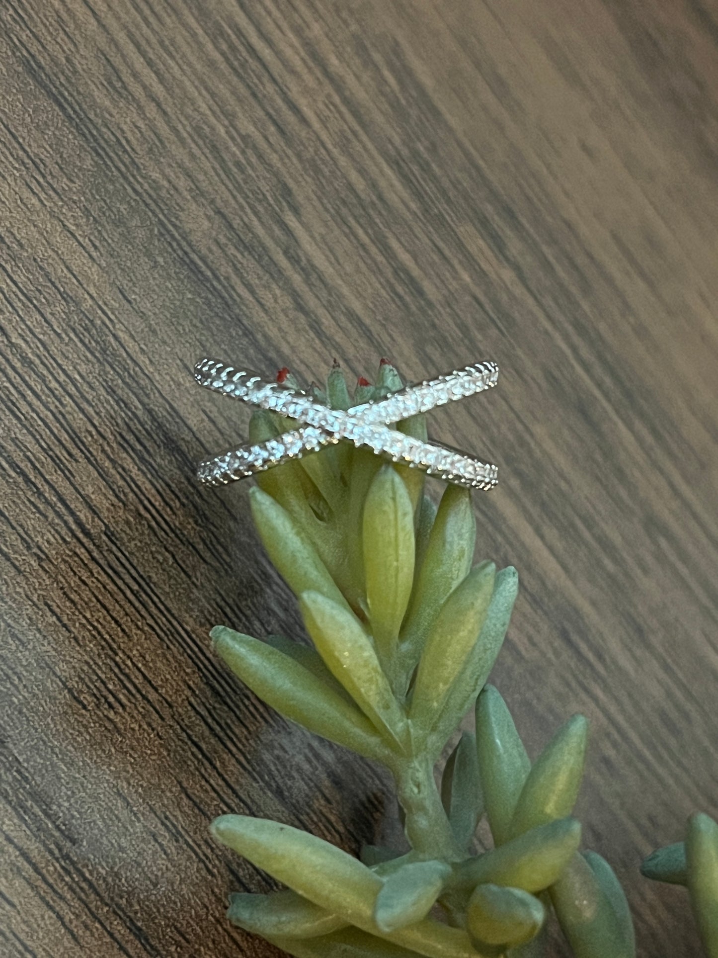 Elegant Crossover ring with CZ inlay