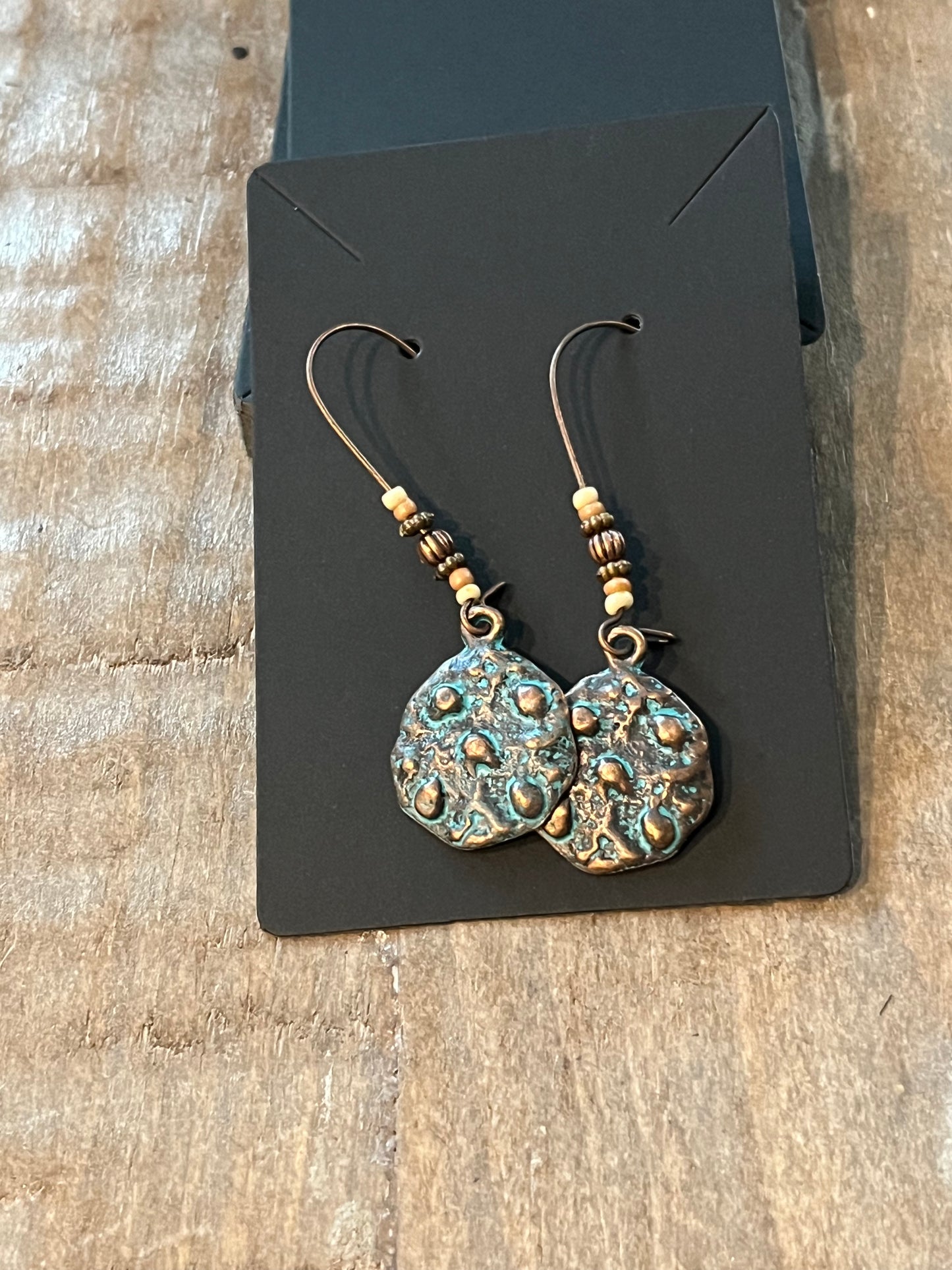 Vintage hook dangle earrings with patina look rustic medallion