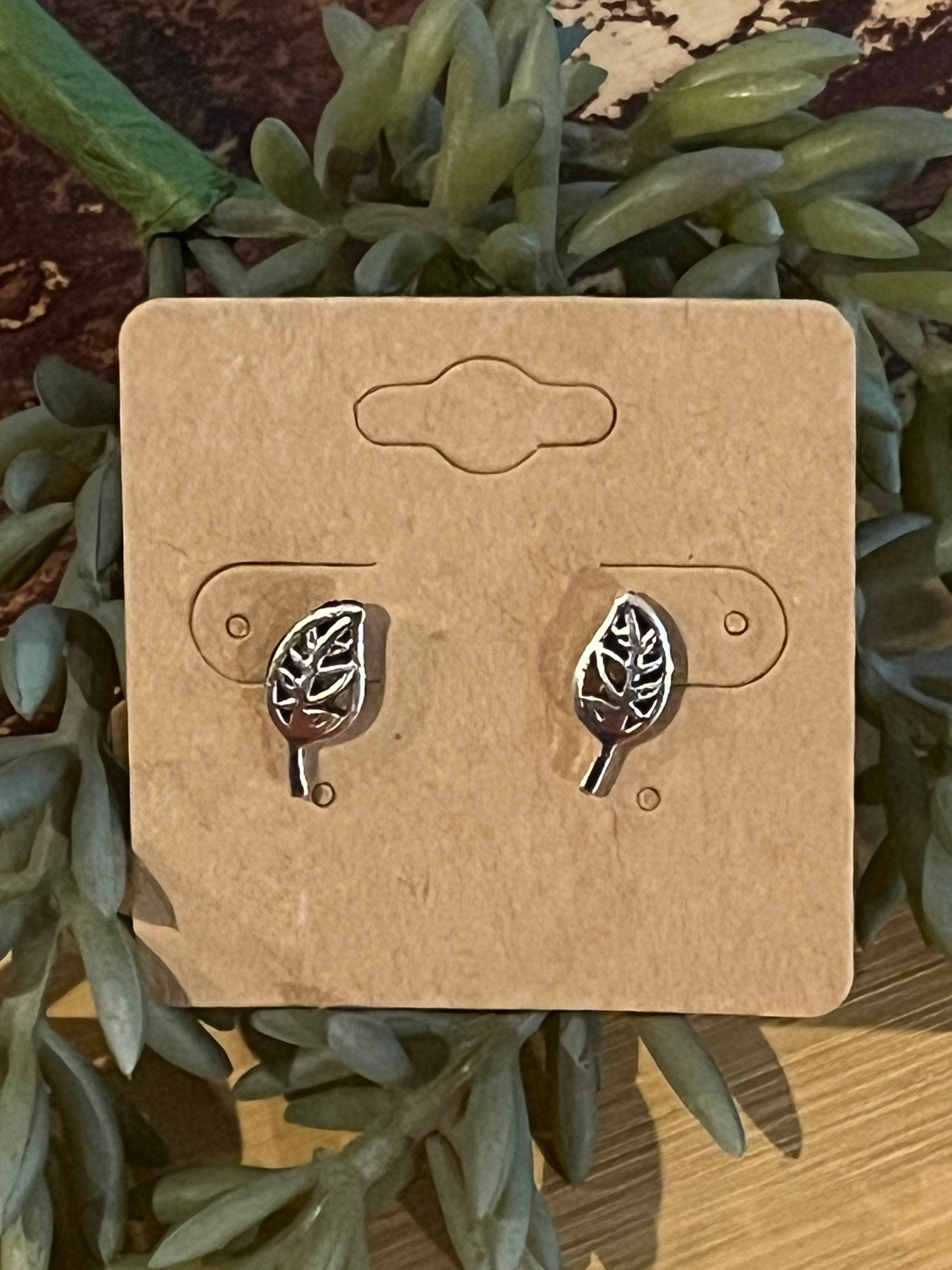 Small silver leaf stud earrings