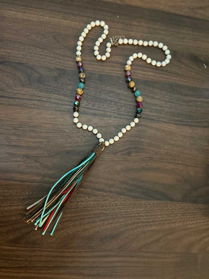 Boho beaded necklace with a tassel pendant