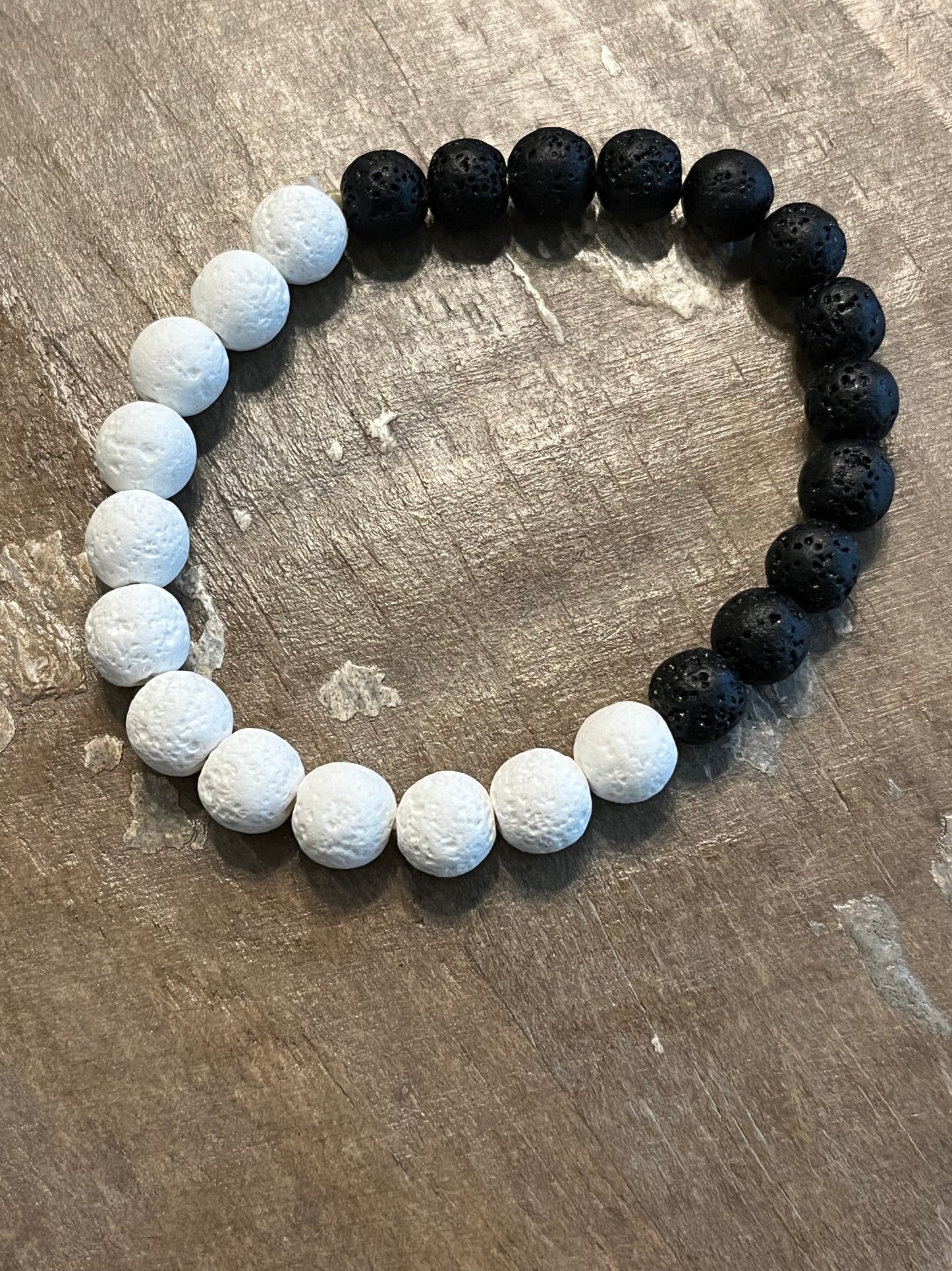 Strength and Hope- white and black lava bead bracelet