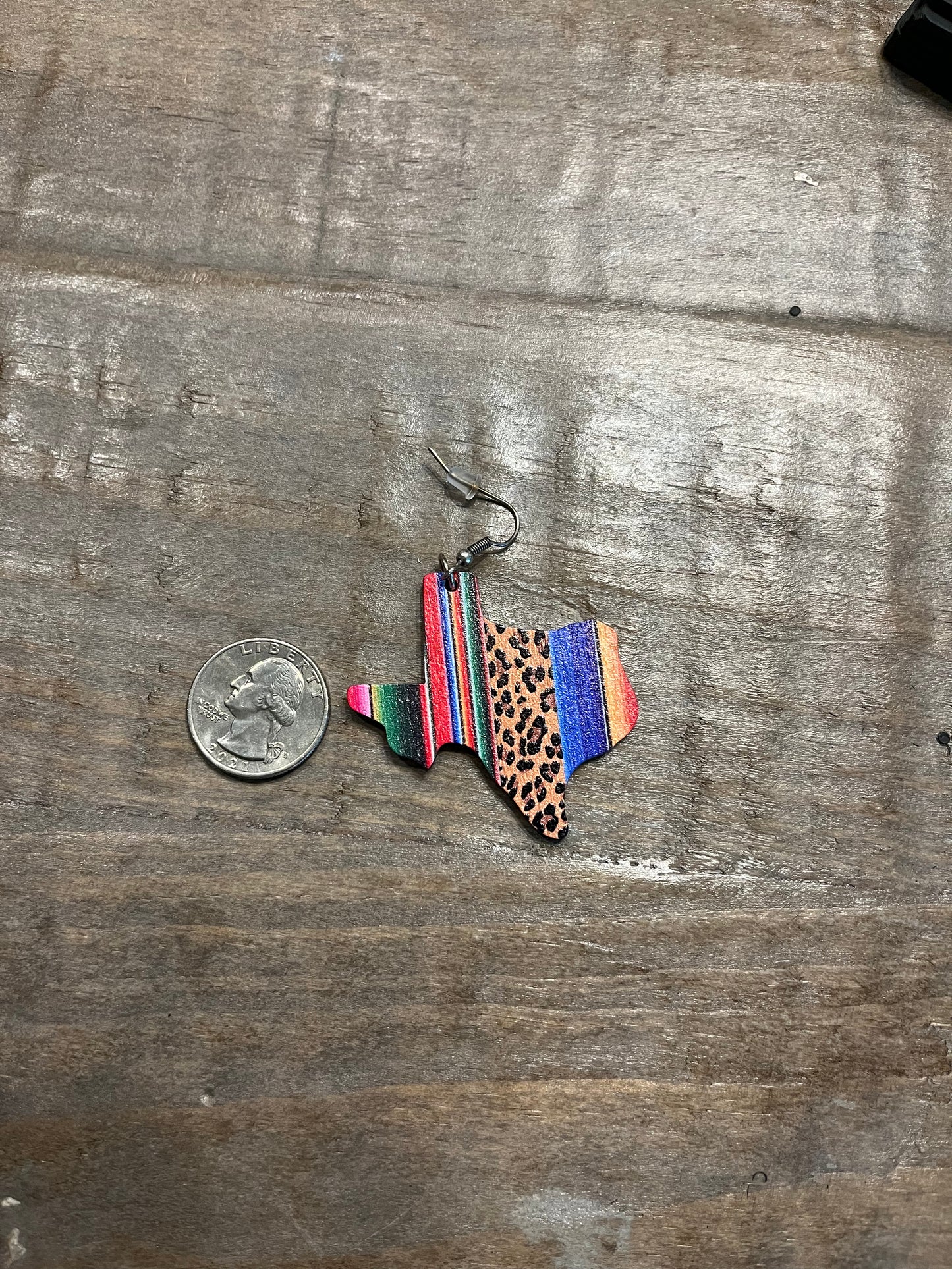 Texas shaped serape print drop earrings