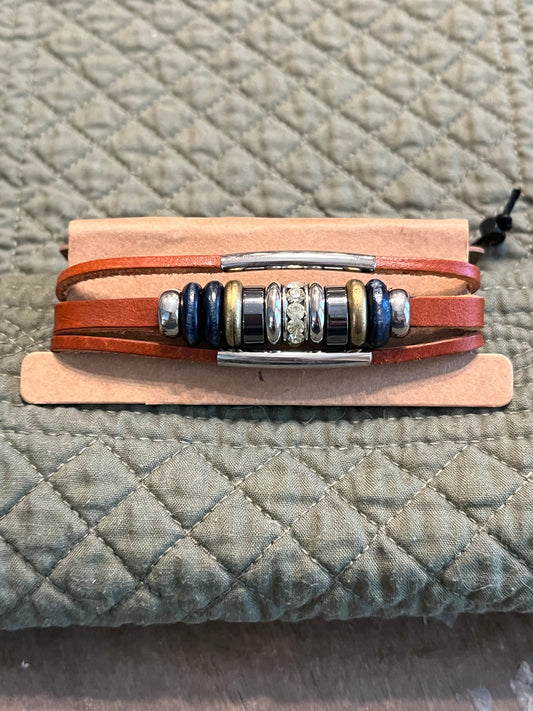 Warm red brown leather bracelet with bead detail