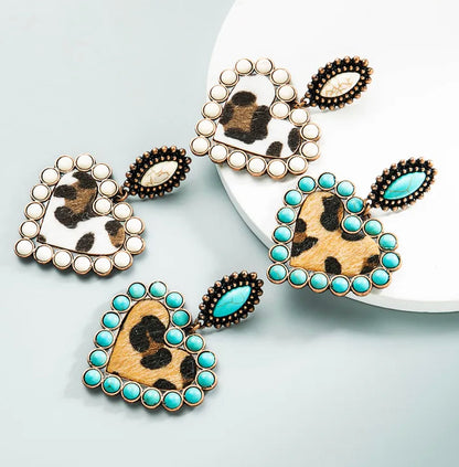 Heart shaped earrings with cream colored beading and leopard print