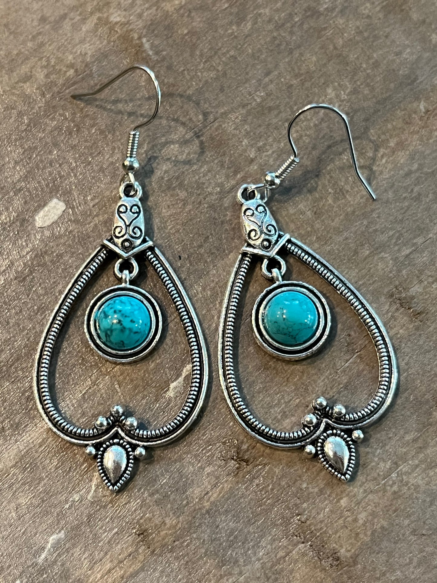 Drop Southwestern silver earrings with turquoise stone