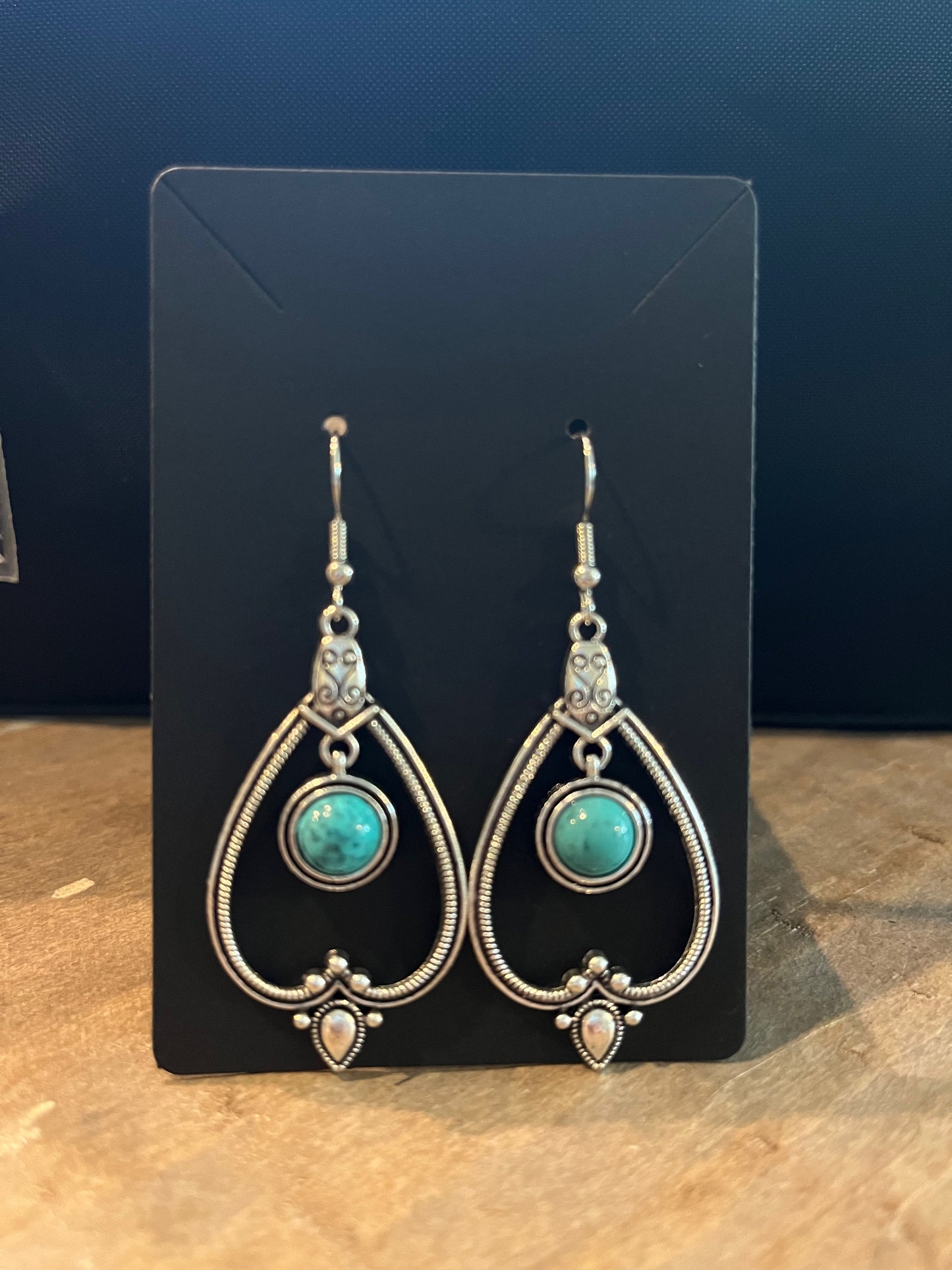 Drop Southwestern silver earrings with turquoise stone