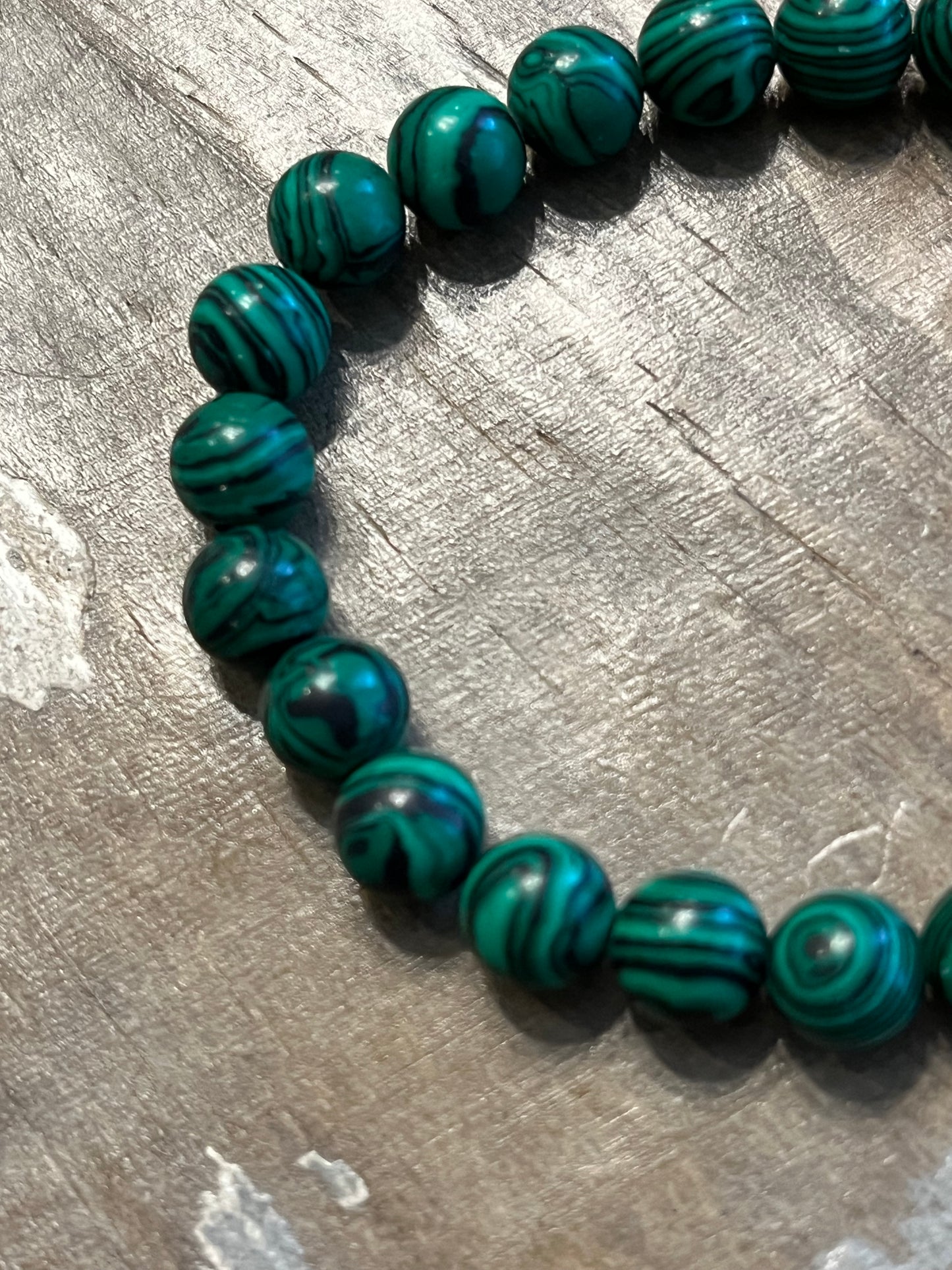 Black and emerald green malachite beaded bracelet