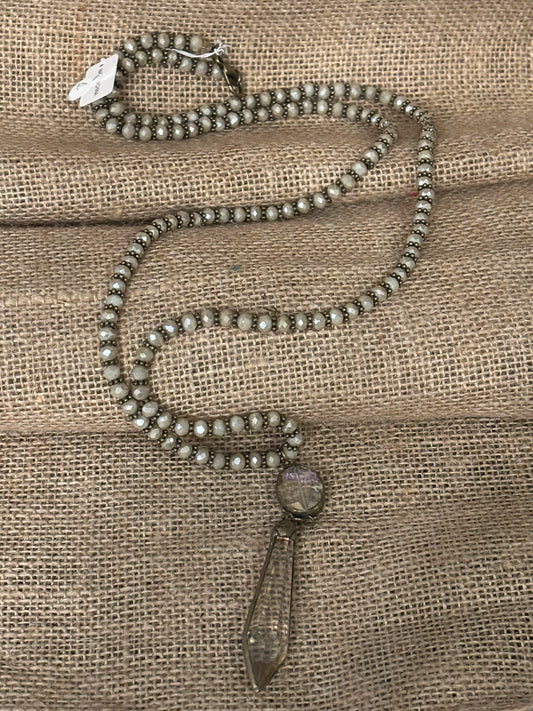 Long Beaded Ivory Necklace with Long Crystal Pendant